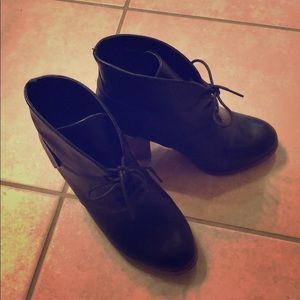 Lightly worn heeled booties